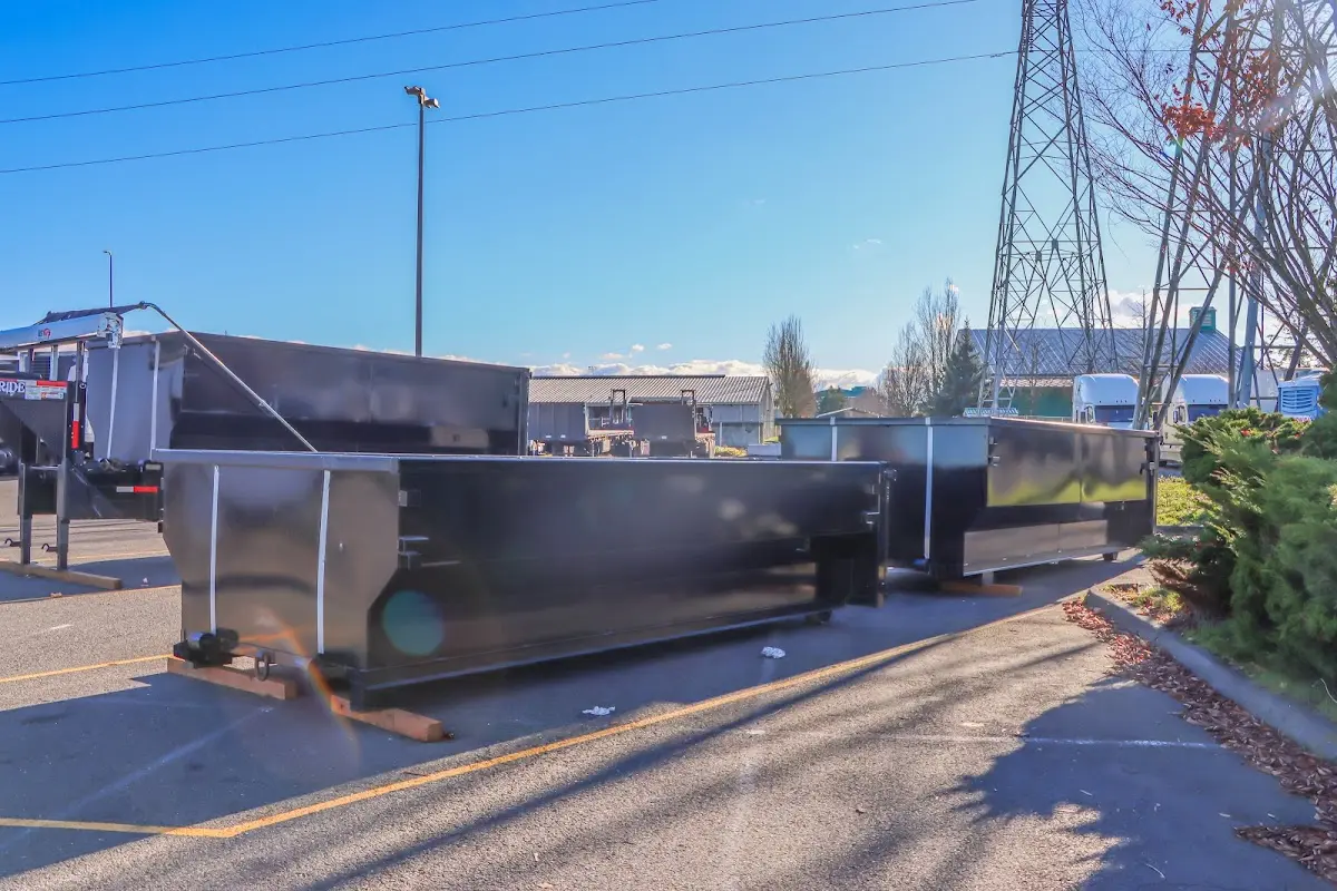 Roll-off dumpster ready for waste disposal at job site for Yard Waste Dumpster Rental in San Leon